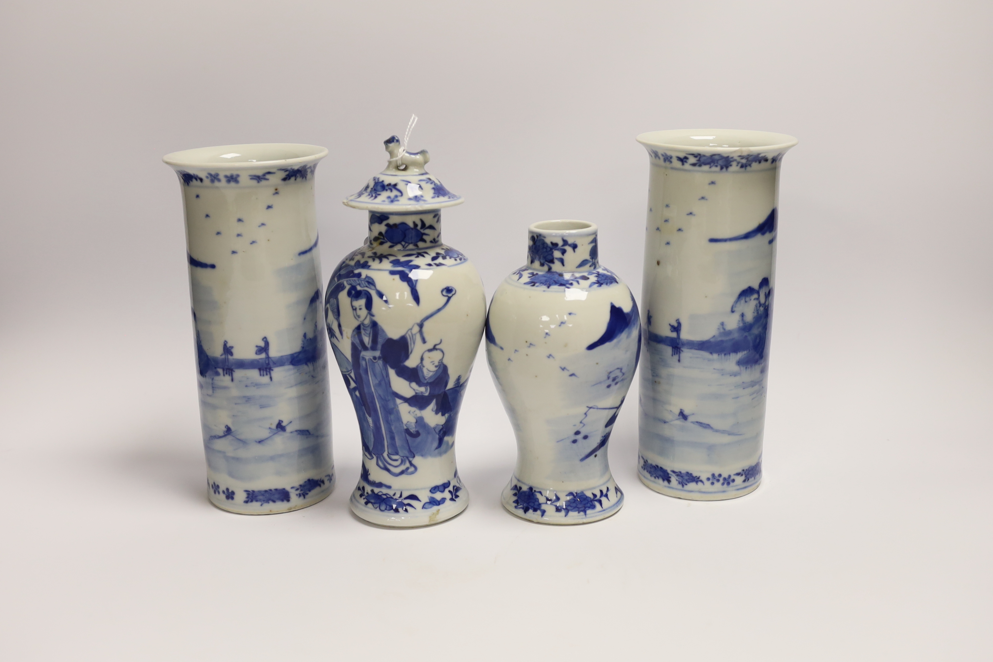 A pair of early 20th century Chinese blue and white sleeve vases and two others, one cover, tallest 21cm